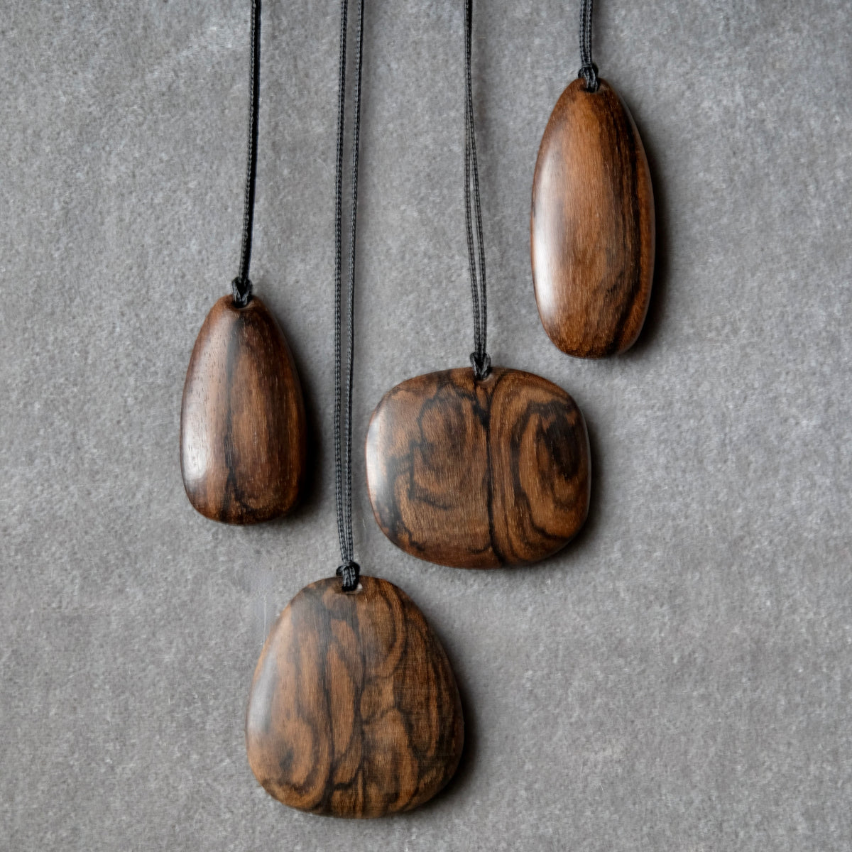 Assorted Carved Ziricote Pendants