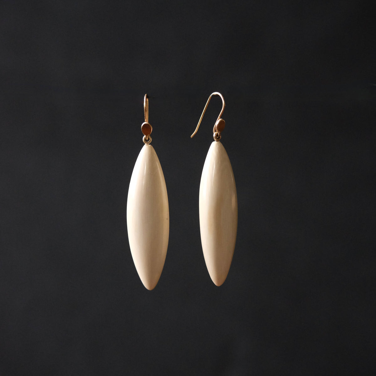 Hand Carved Slender Fossil Ivory Dangling Earrings