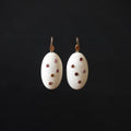 Hand Carved Oval Fossil Ivory Earrings with Tourmaline