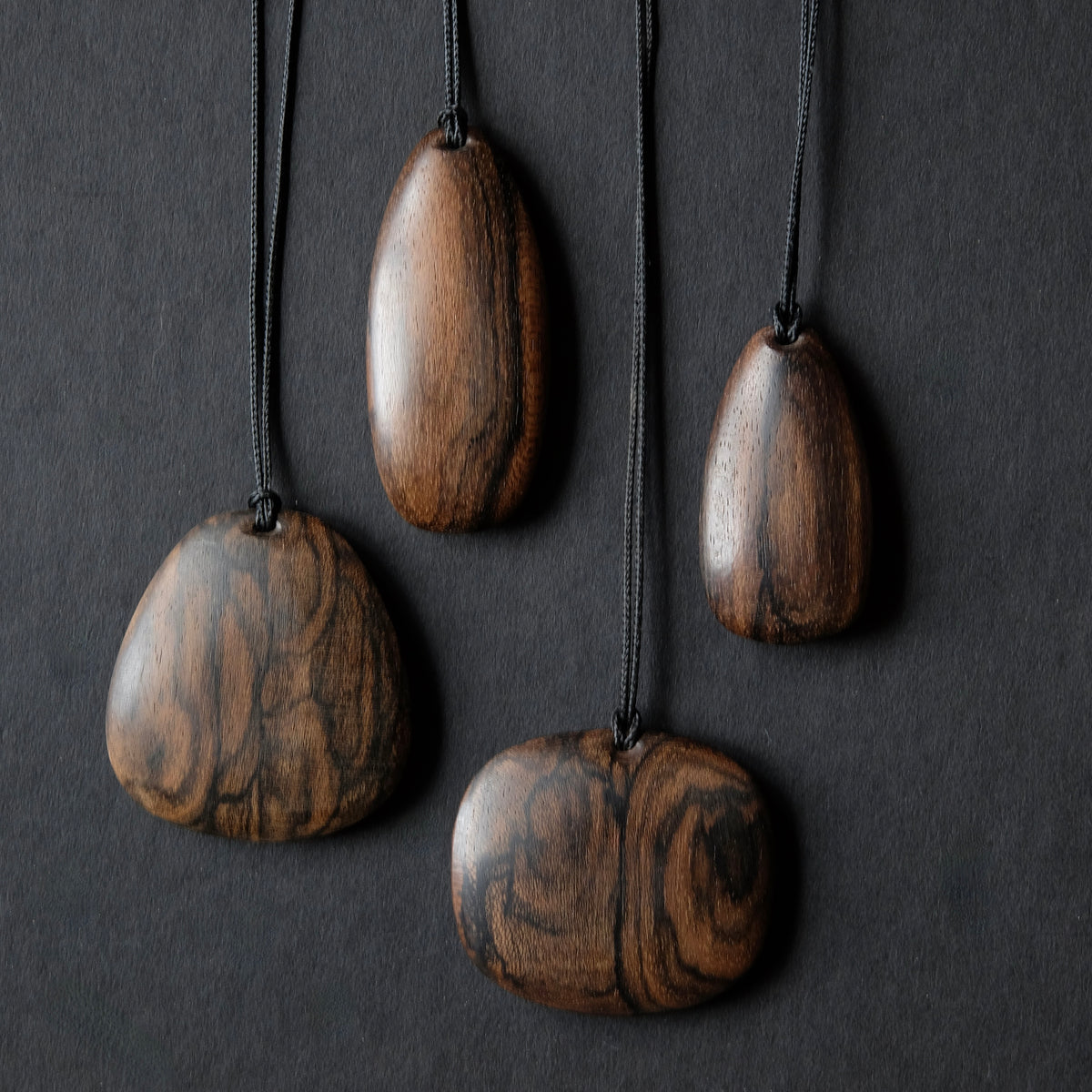 Assorted Carved Ziricote Pendants
