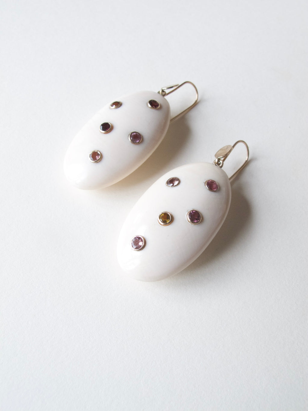 Hand Carved Oval Fossil Ivory Earrings with Tourmaline