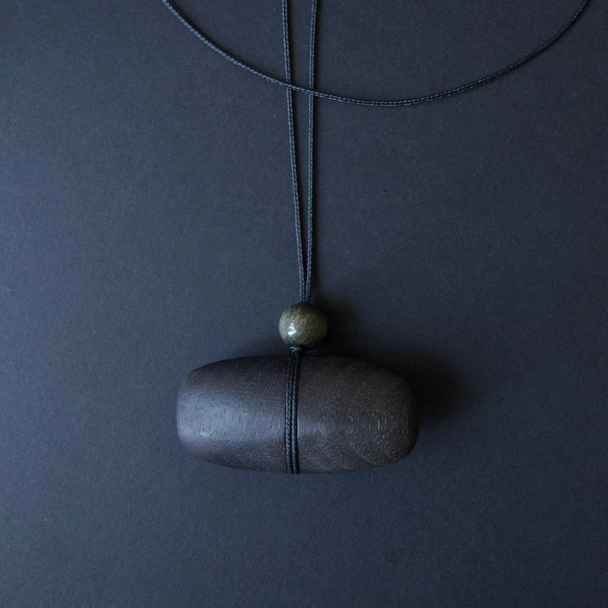 Hand Carved Blackened Walnut Pendant with Obsidian