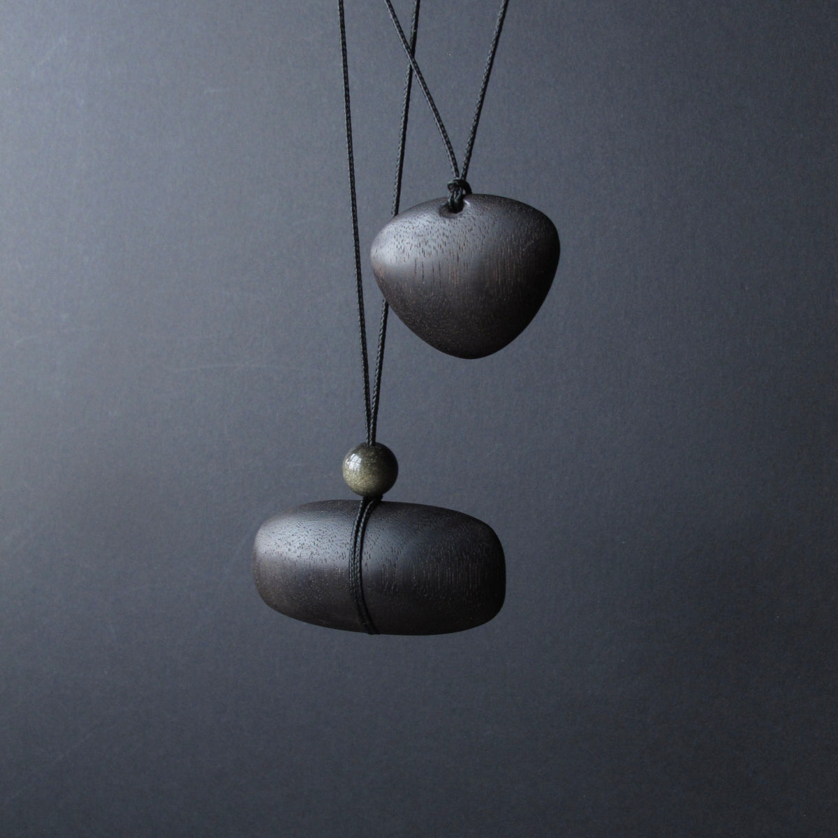 Hand Carved Blackened Walnut Pendant with Obsidian