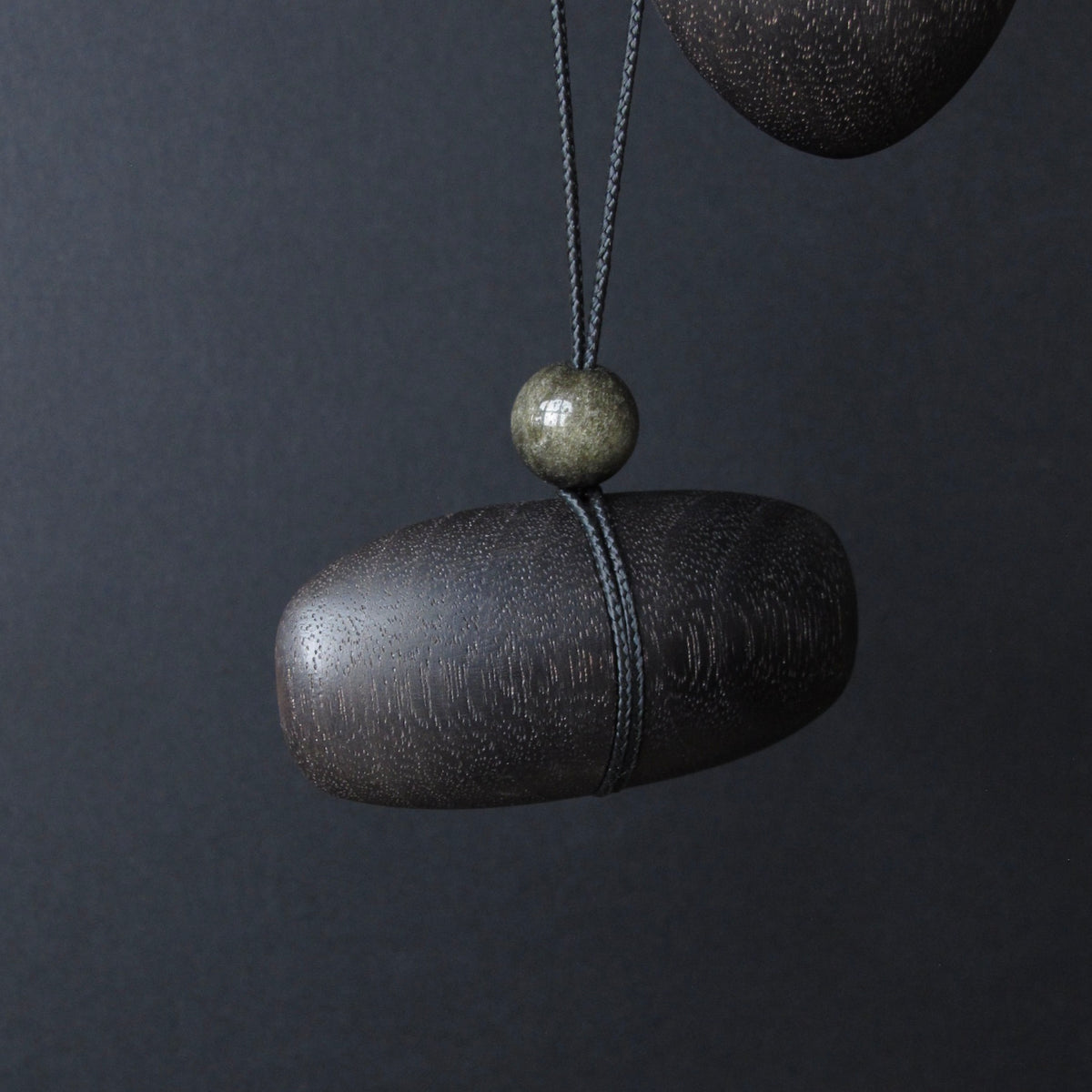 Hand Carved Blackened Walnut Pendant with Obsidian