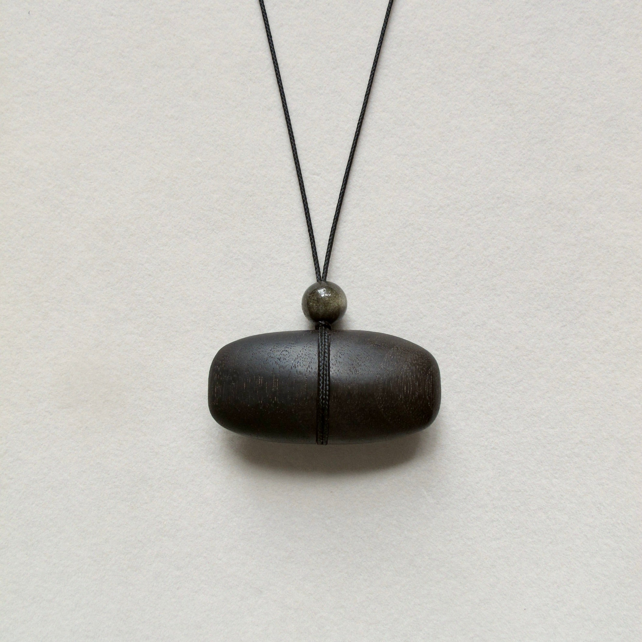 Hand Carved Blackened Walnut Pendant with Obsidian