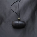 Hand Carved Blackened Walnut Pendant with Obsidian
